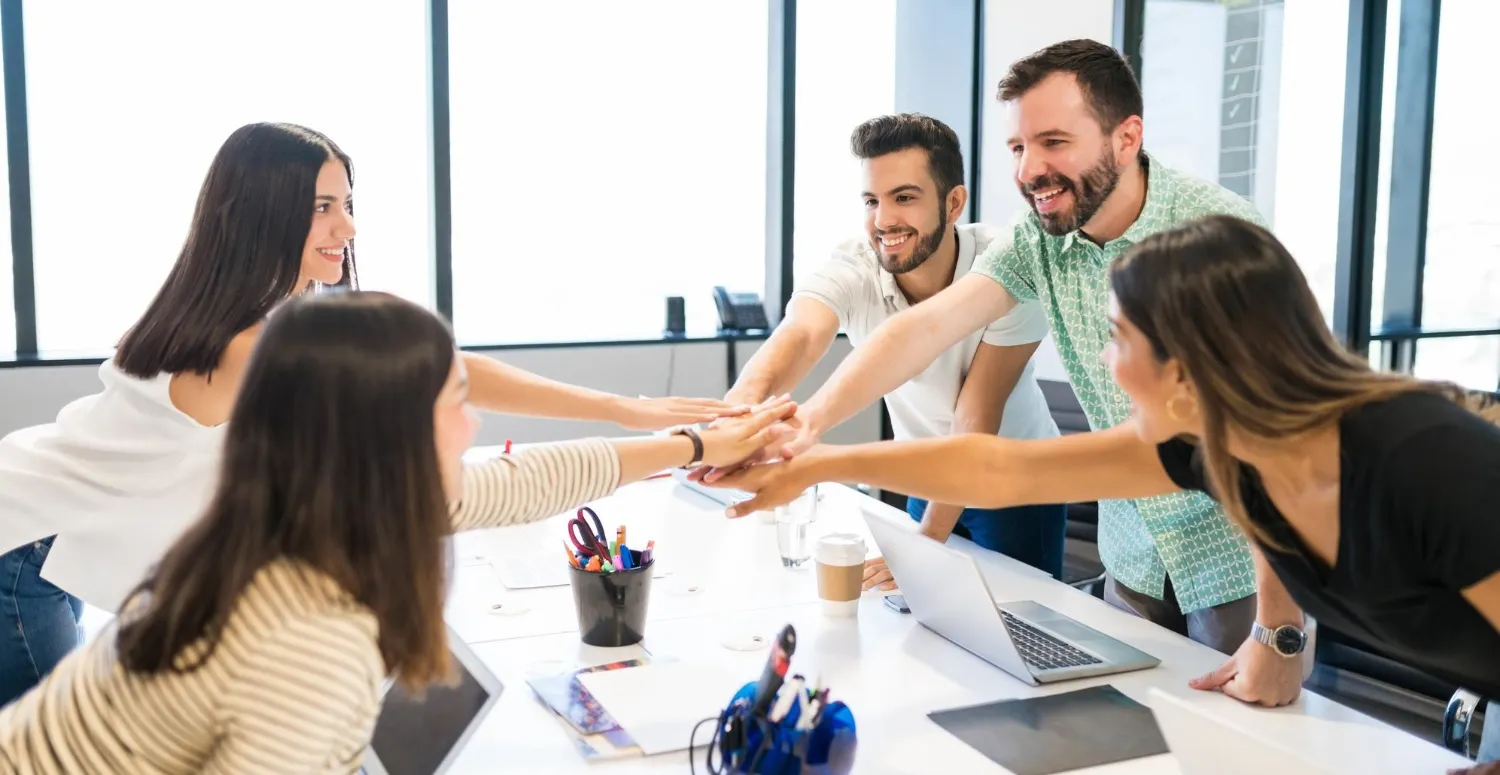 team members in a office Team Meeting